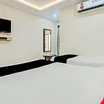 Capital O75502 Hotel Asian International