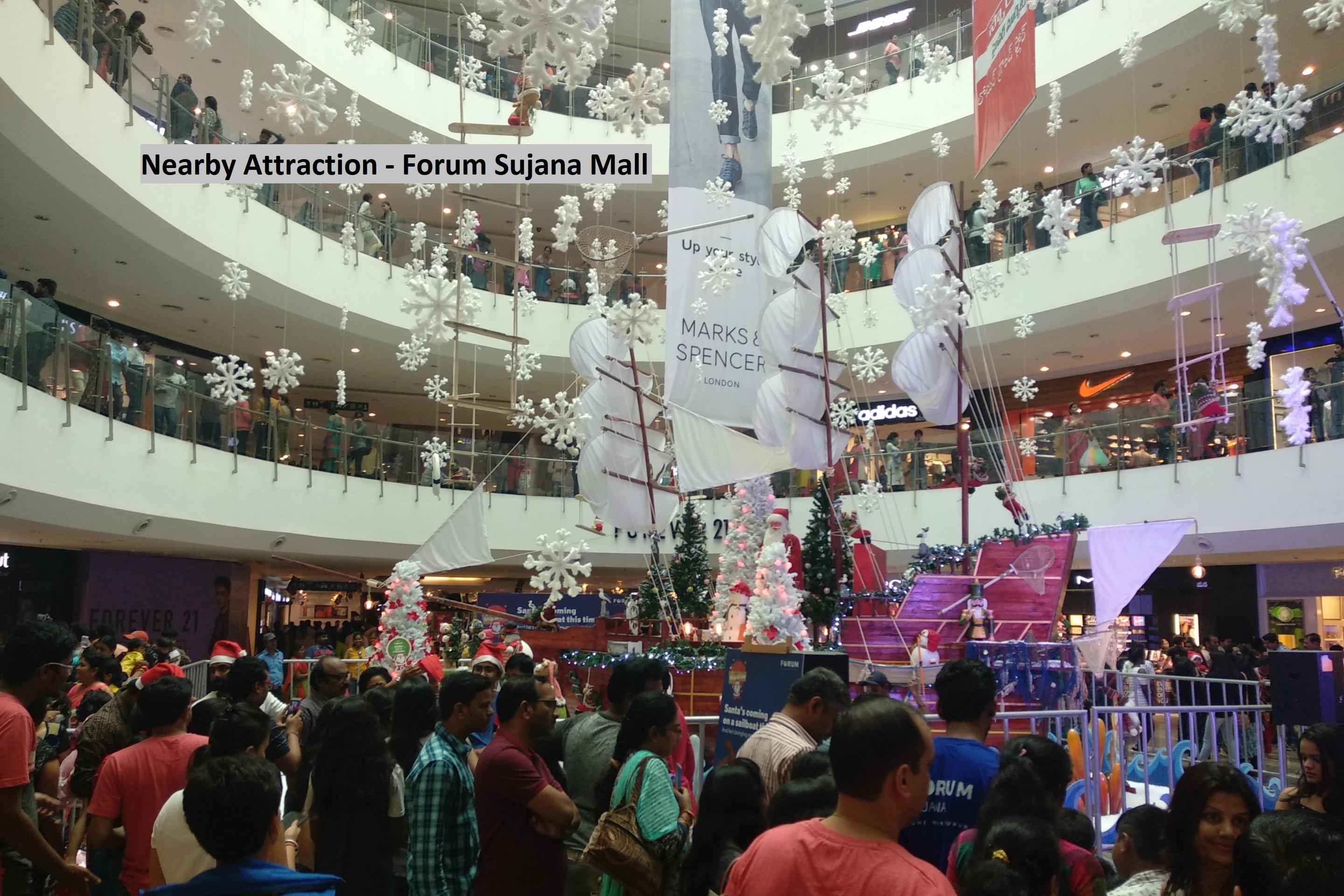 Capital O Sri Navya Grand Near Nexus Hotel