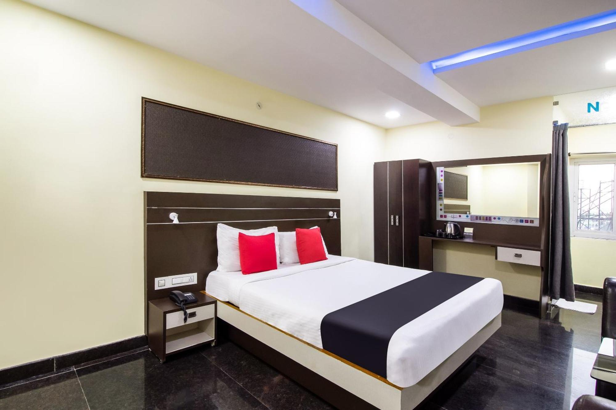 Capital O Sri Navya Grand Near Nexus Hotel