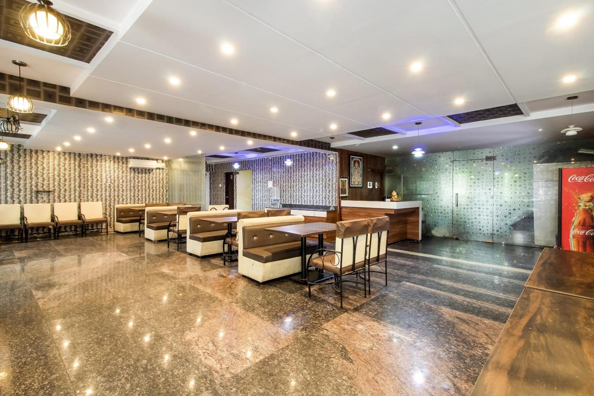 Capital O Sri Navya Grand Near Nexus Hotel