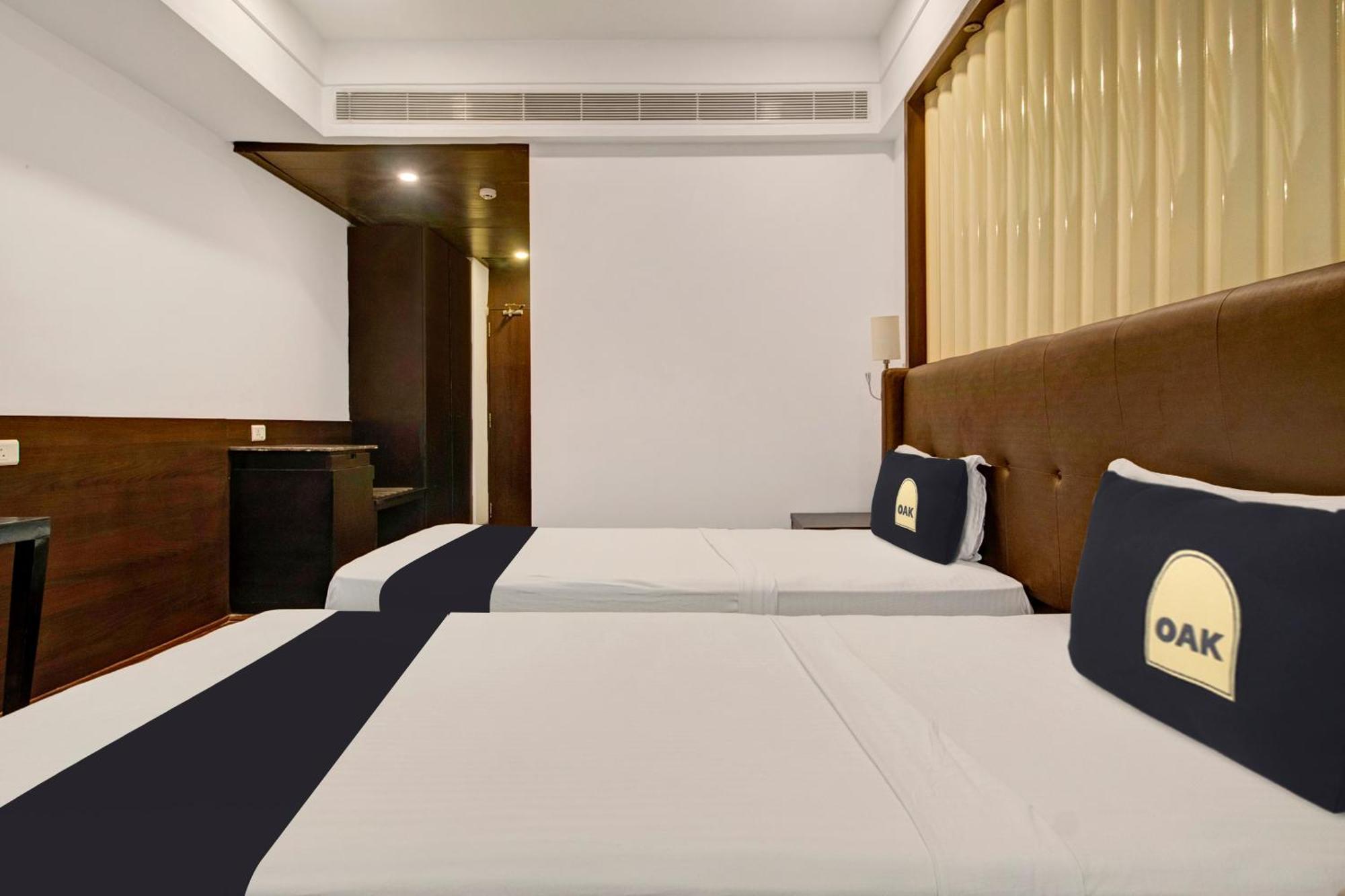 Capital O Grand Himayat Hotel
