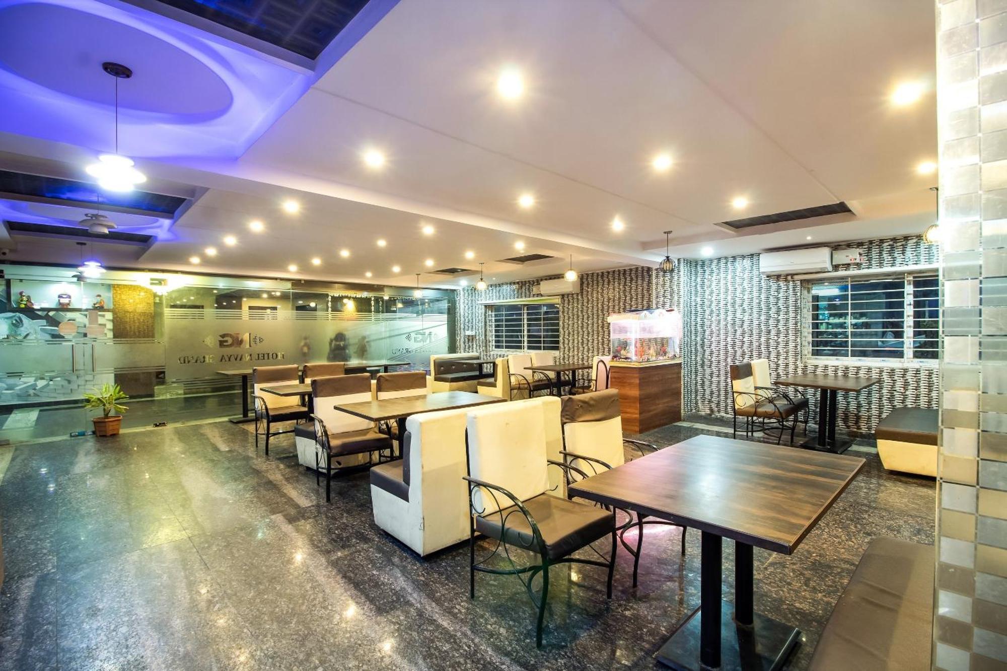 Capital O Sri Navya Grand Near Nexus Hotel