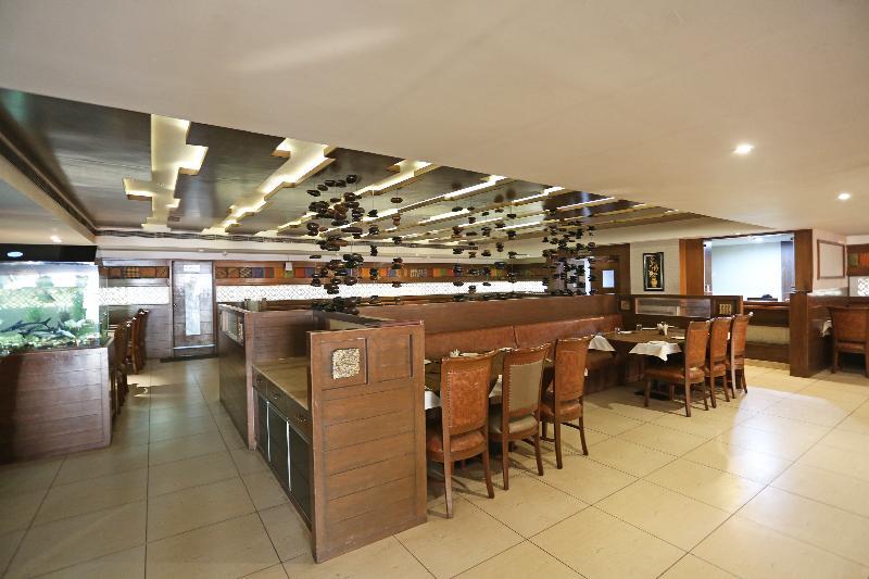 Capital O Surabhi Elite Near Miraj Cinemas - Shalini Shivani Hotel Hyderabad